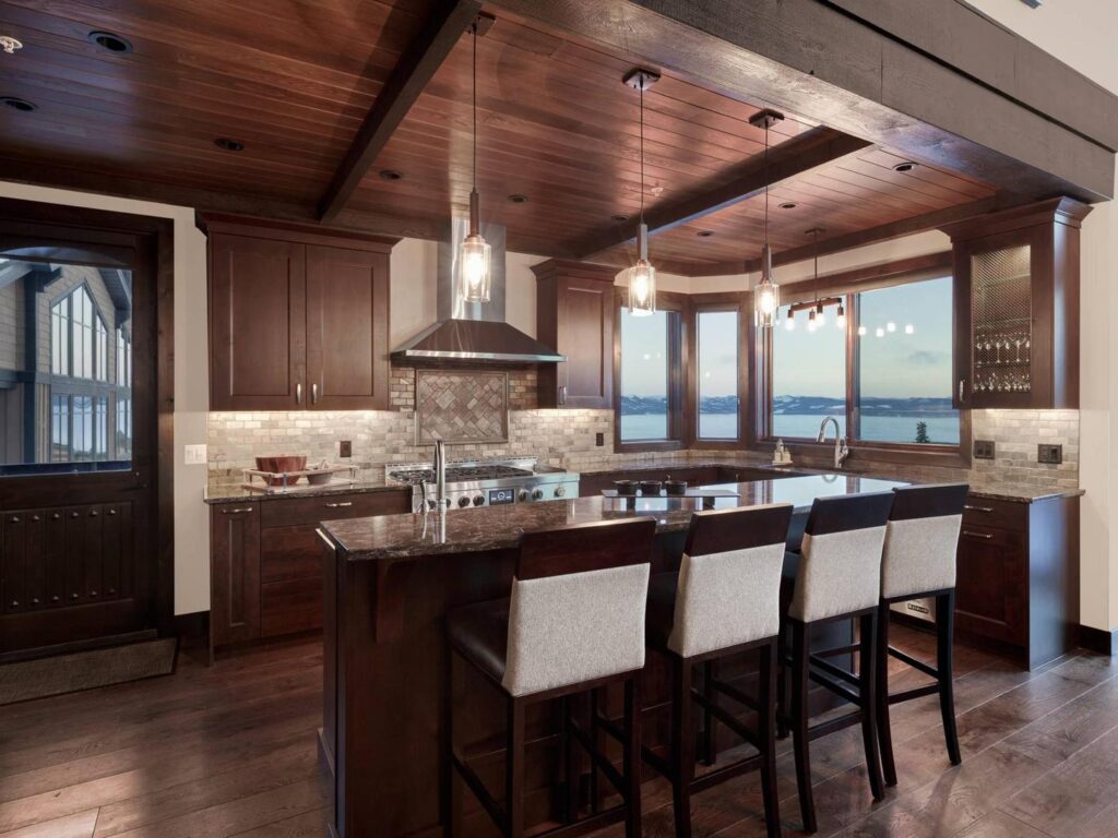 Stunning modern gourmet kitchen and dining bar in a vacation rental at Big White.