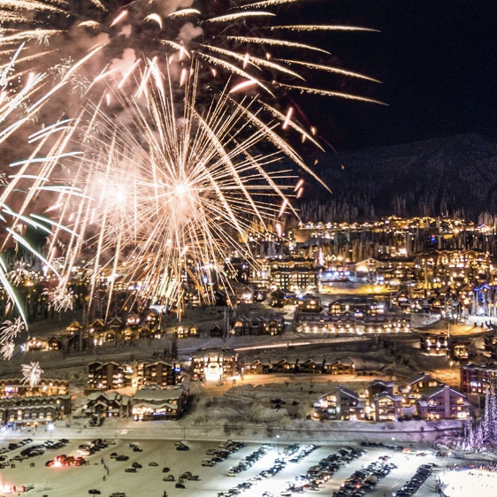 The beautiful Saturday fireworks at Big White Ski Resort blasting over the resort at night during the ski season.
