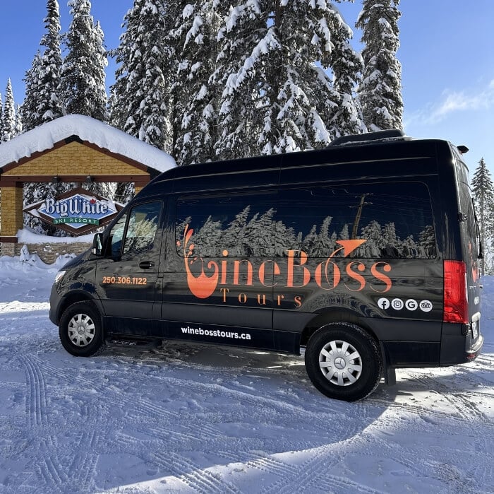 Wine Boss Tours van offering a Big White Shuttle service from Kelowna, BC, Canada.